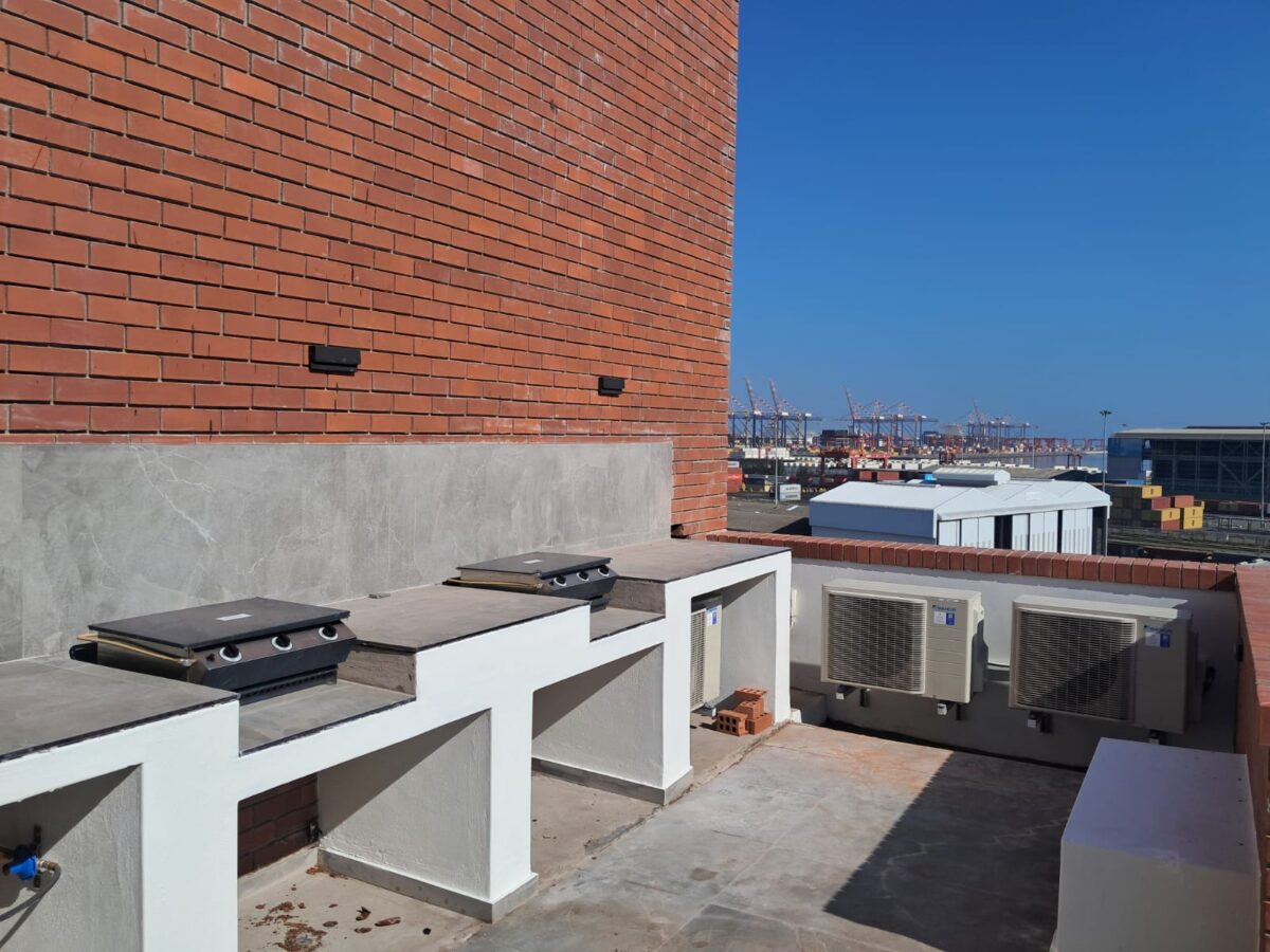 Outdoor gas braai area overlooking Cape Town’s working harbour